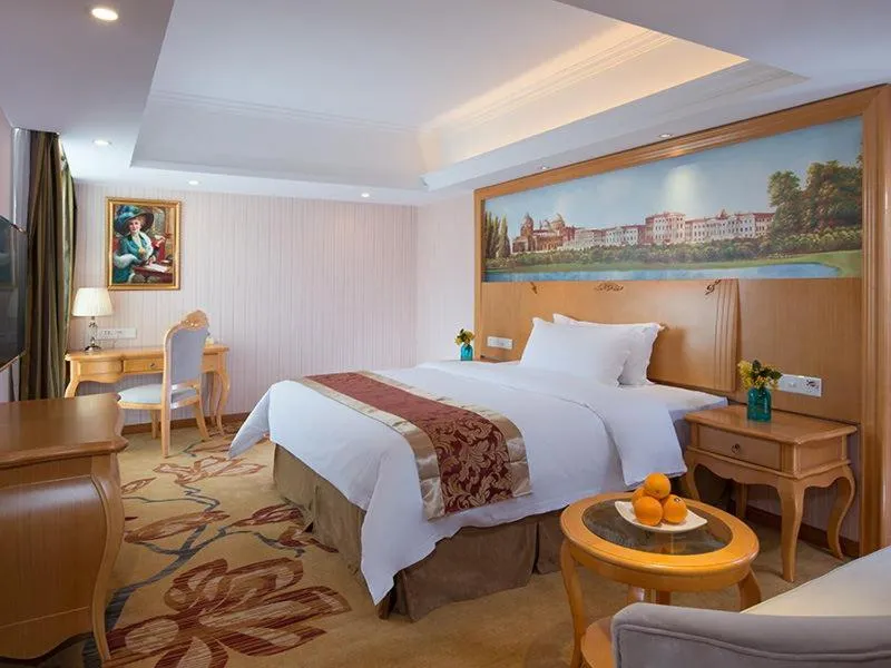 Bed in Vienna International Hotel Guangdong Foshan Shunde Ronggui