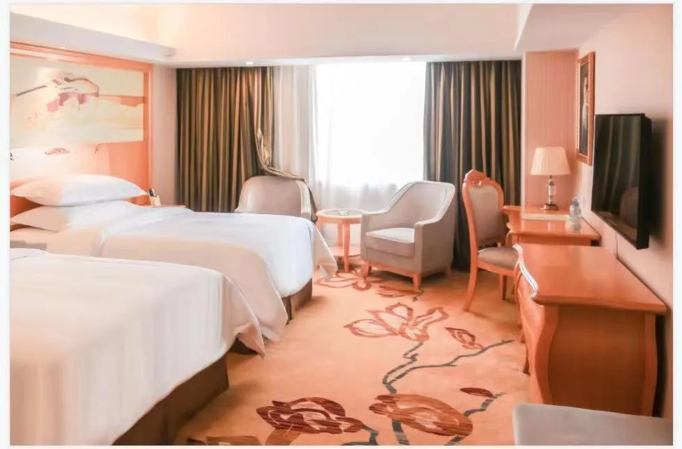 Bed in Vienna International Hotel Guangdong Foshan Shunde Ronggui