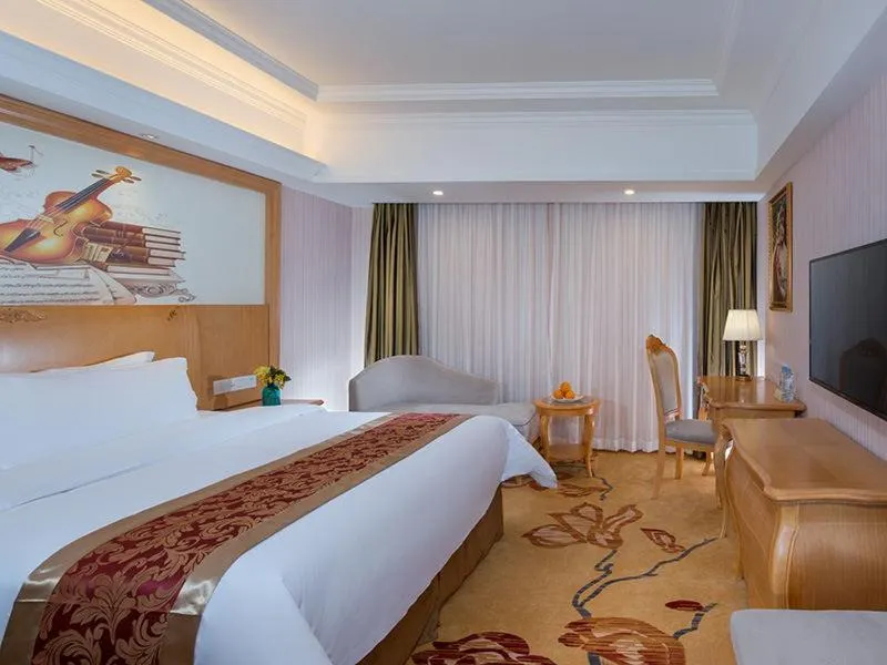 Bed in Vienna International Hotel Guangdong Foshan Shunde Ronggui