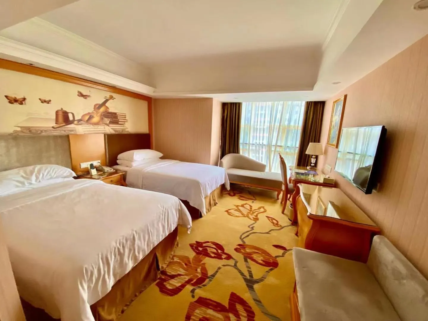 Bed in Vienna International Hotel Guangdong Foshan Shunde Ronggui