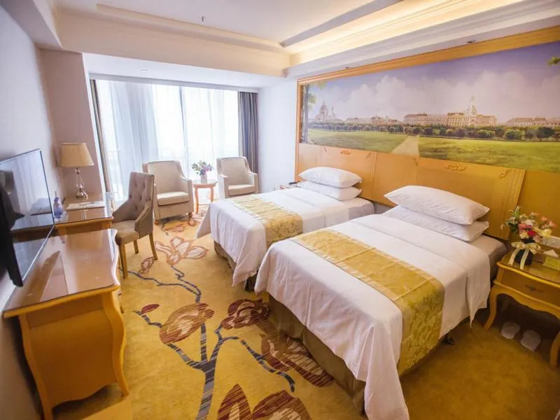 Bed in Vienna Hotel Guangdong Huizhou Jiangbei Sanxin
