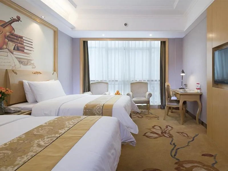 Bed in Vienna Hotel Guangxi Nanjing Nanhu Park