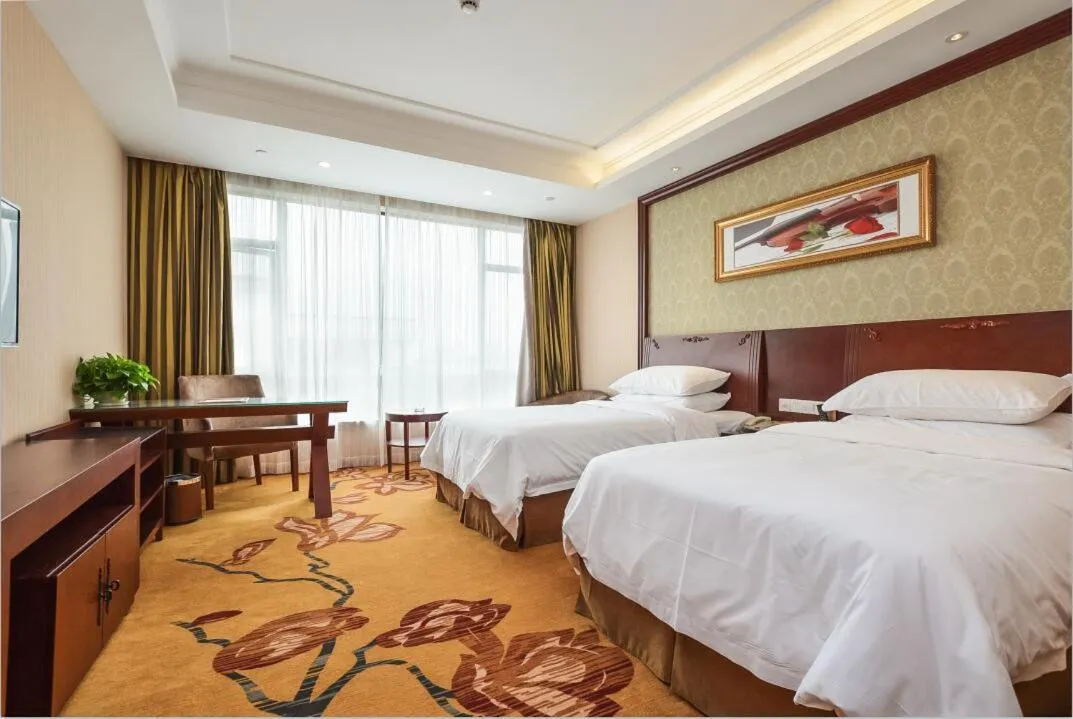 Bed in Vienna Hotel Suzhou Yangcheng Lake Huayi Movie World