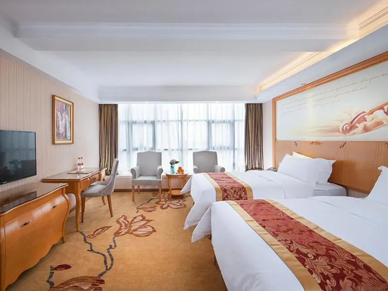 Bed in Vienna Hotel Shenzhen Gongming Huafa North Road