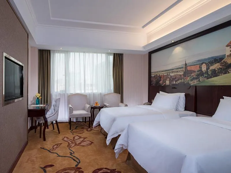Bed in Vienna Hotel Guangdong Donguan Daling Mountain Sports Park