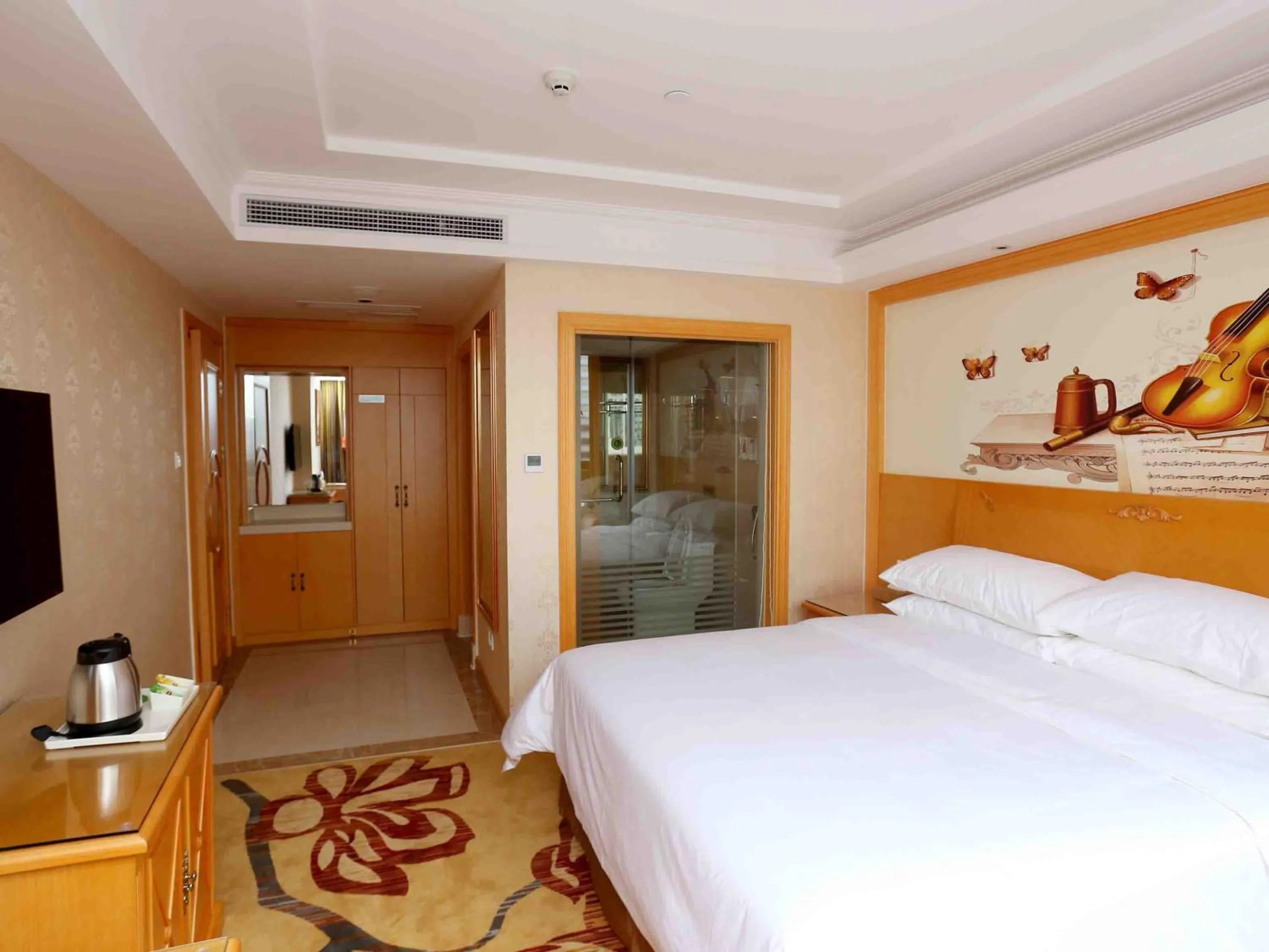 Bed in Vienna Hotel Zhongshan West District