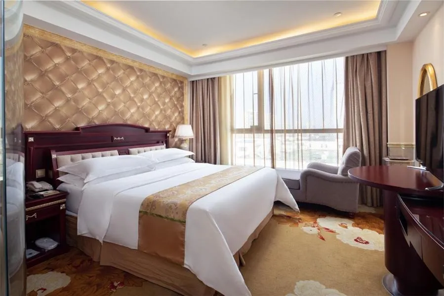 Bed in Vienna International Hotel Taicang Wanda Square