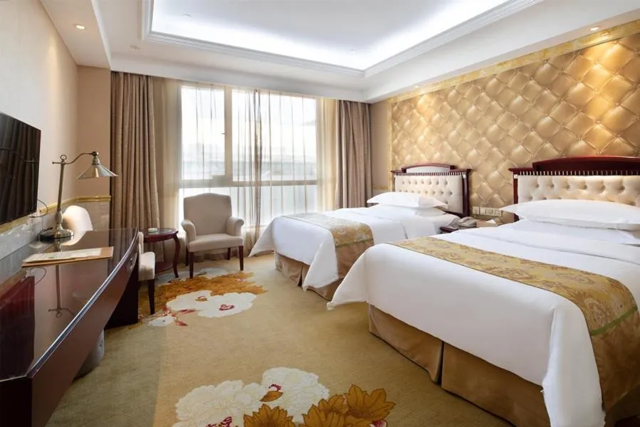 Bed in Vienna International Hotel Taicang Wanda Square