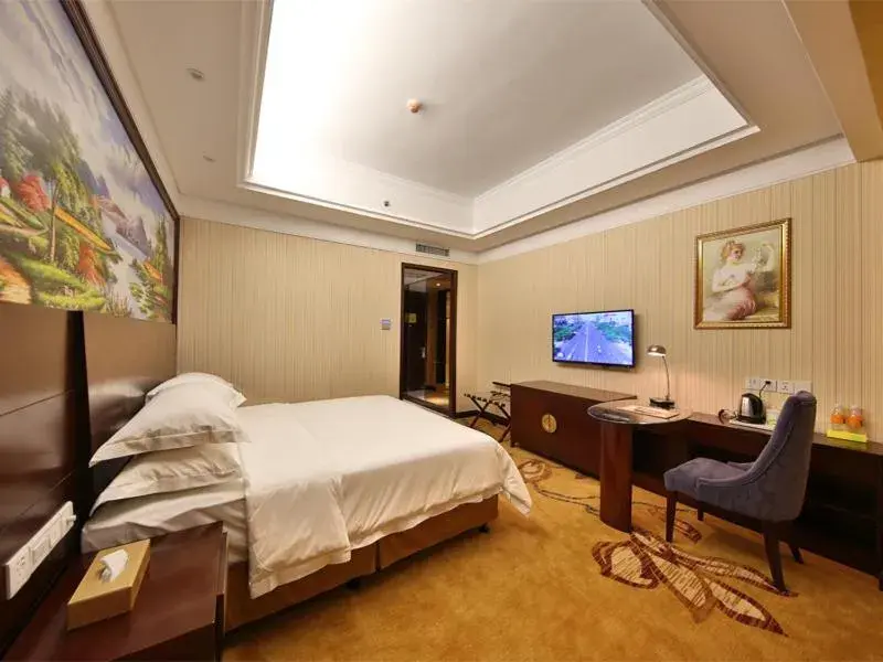 Bed in Vienna International Hotel Zhangjiajie Tianmen Mountain Bed in Vienna International Hotel Zhangjiajie Tianmen Mountain