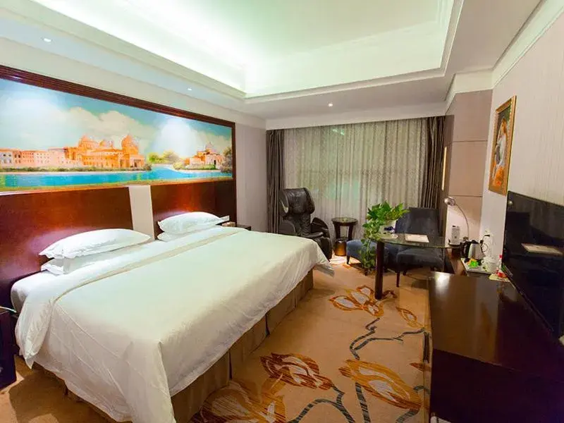 Bed in Vienna International Hotel Zhangjiajie Tianmen Mountain Bed in Vienna International Hotel Zhangjiajie Tianmen Mountain