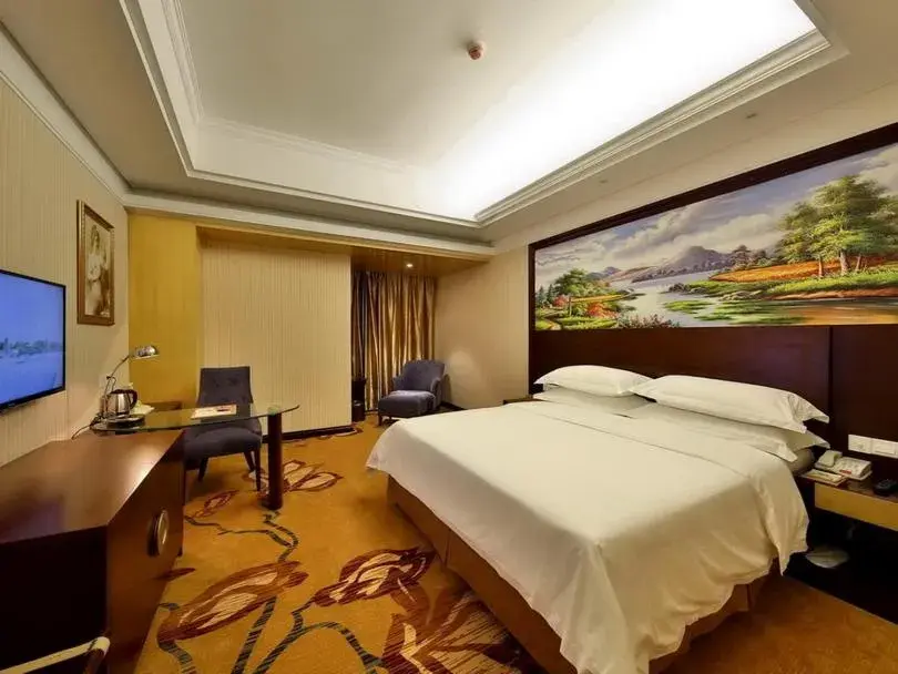 Bed in Vienna International Hotel Zhangjiajie Tianmen Mountain Bed in Vienna International Hotel Zhangjiajie Tianmen Mountain