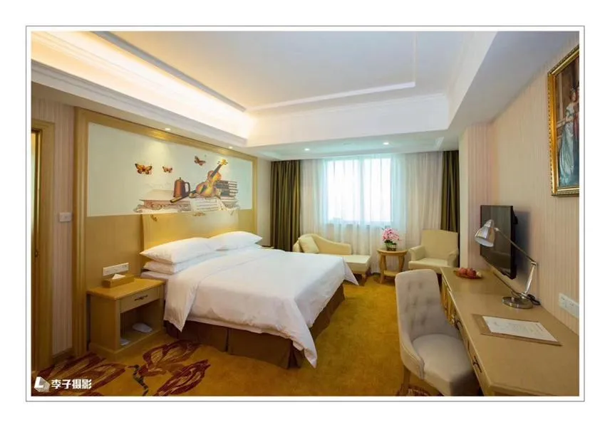 Bed in Vienna Hotel Huizhou Dahuxi