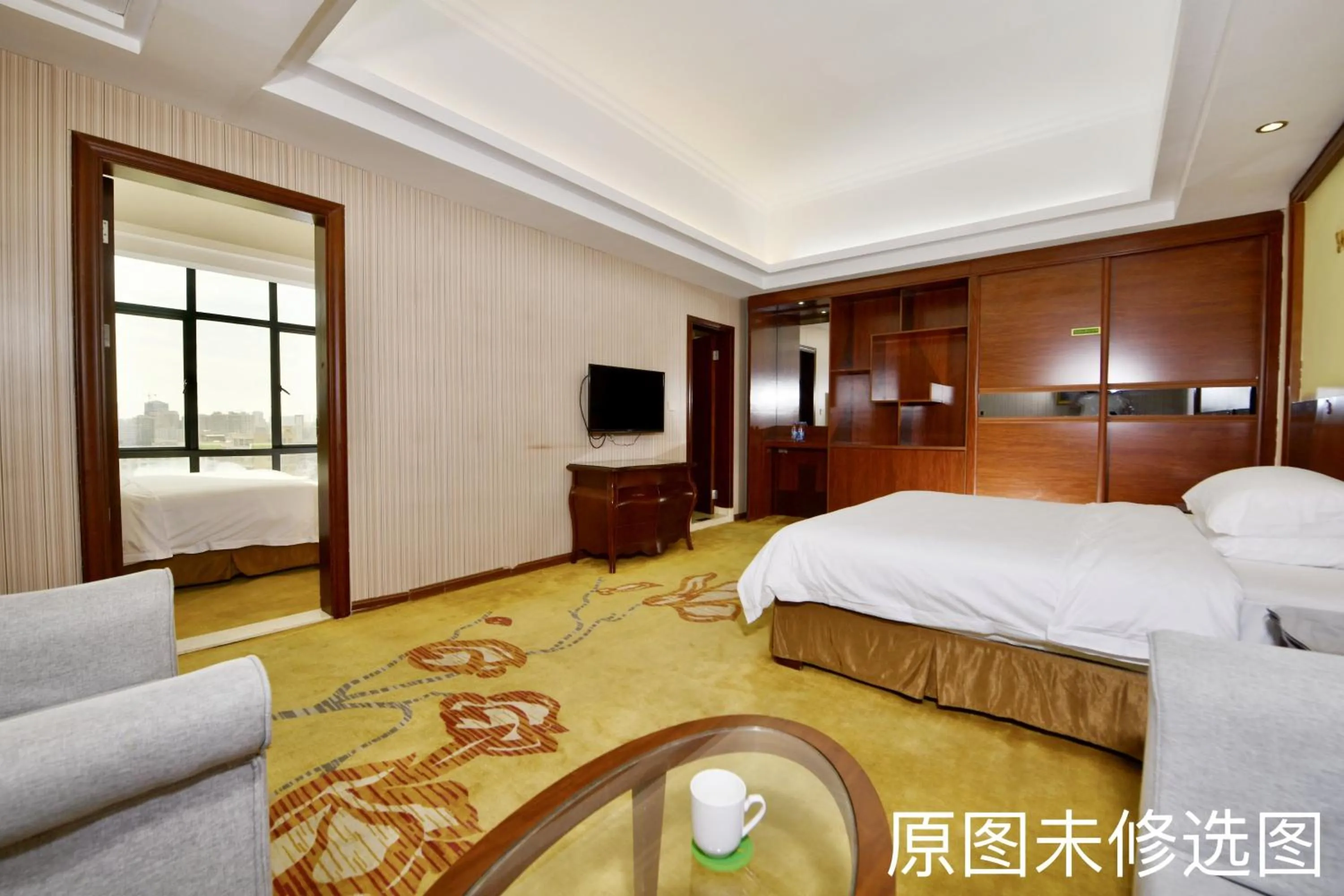 Bed in Vienna International Hotel Jieyang Jieyanglou