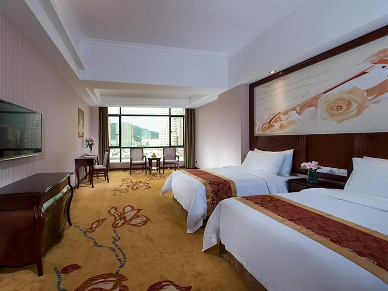 Bed in Vienna International Hotel Jieyang Jieyanglou