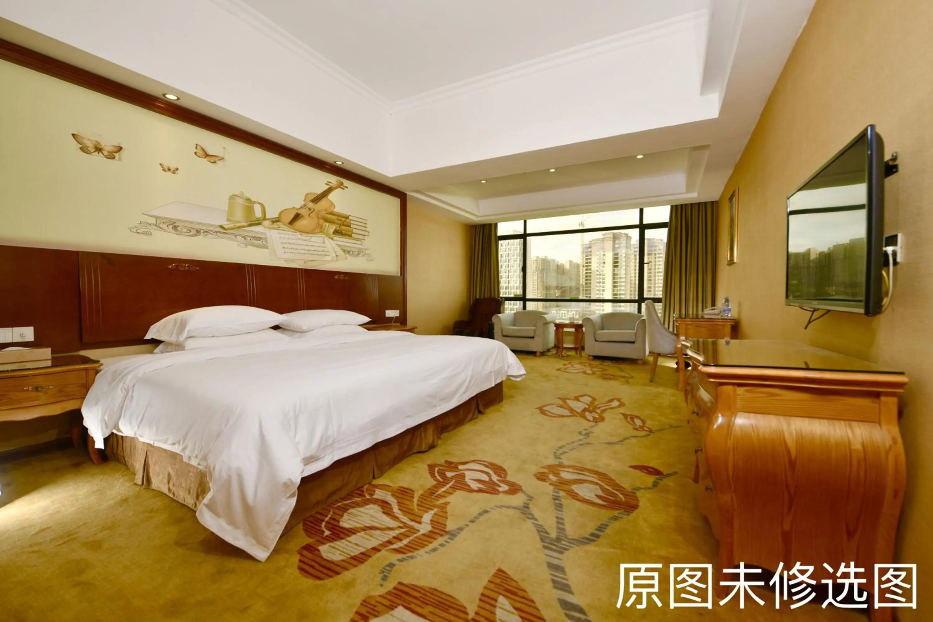 Bed in Vienna International Hotel Jieyang Jieyanglou
