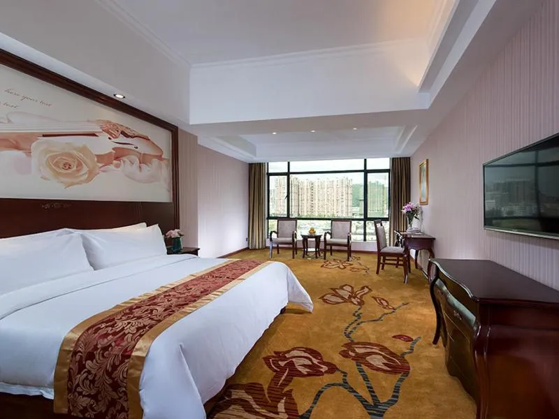 Bed in Vienna International Hotel Jieyang Jieyanglou