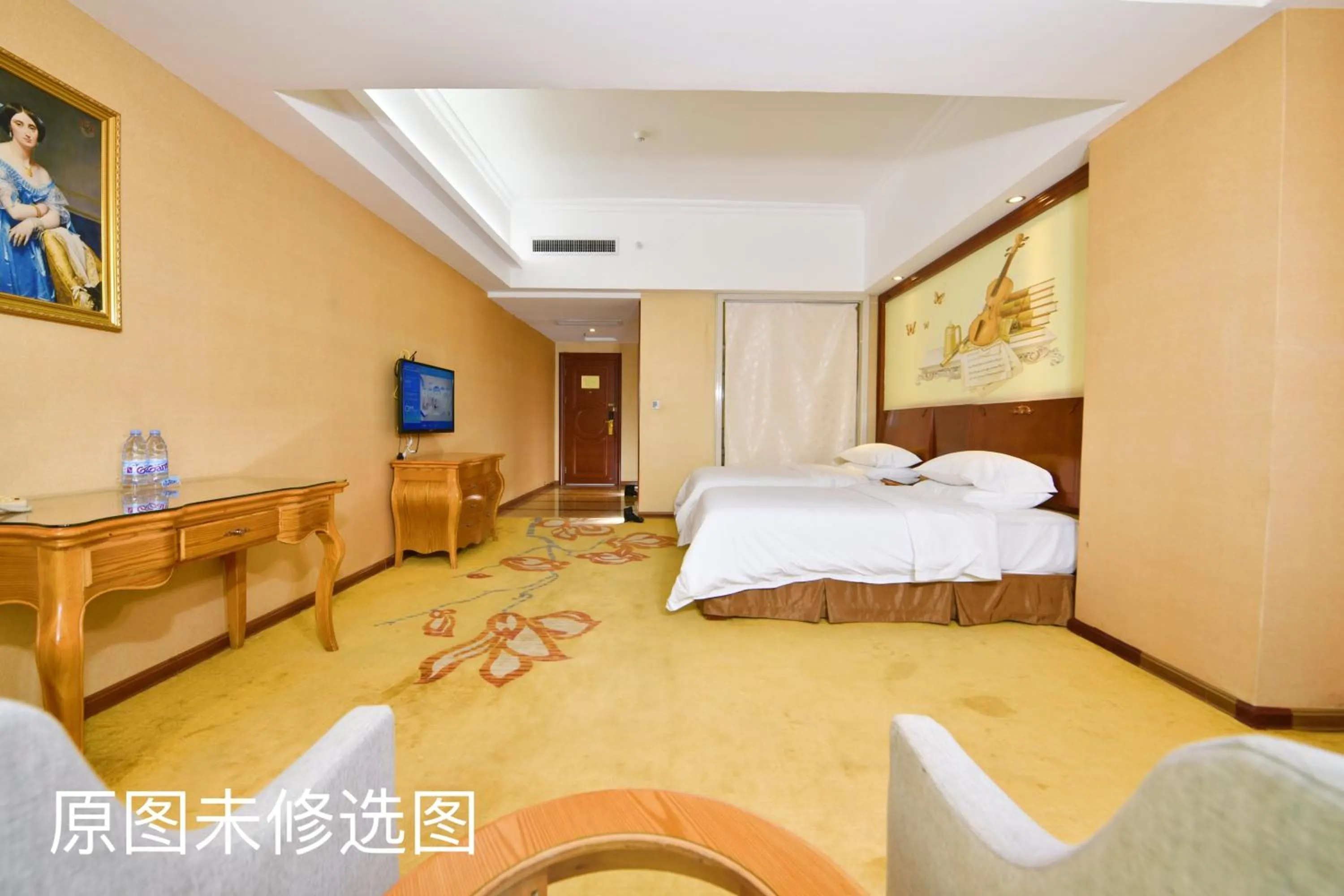 Bed in Vienna International Hotel Jieyang Jieyanglou