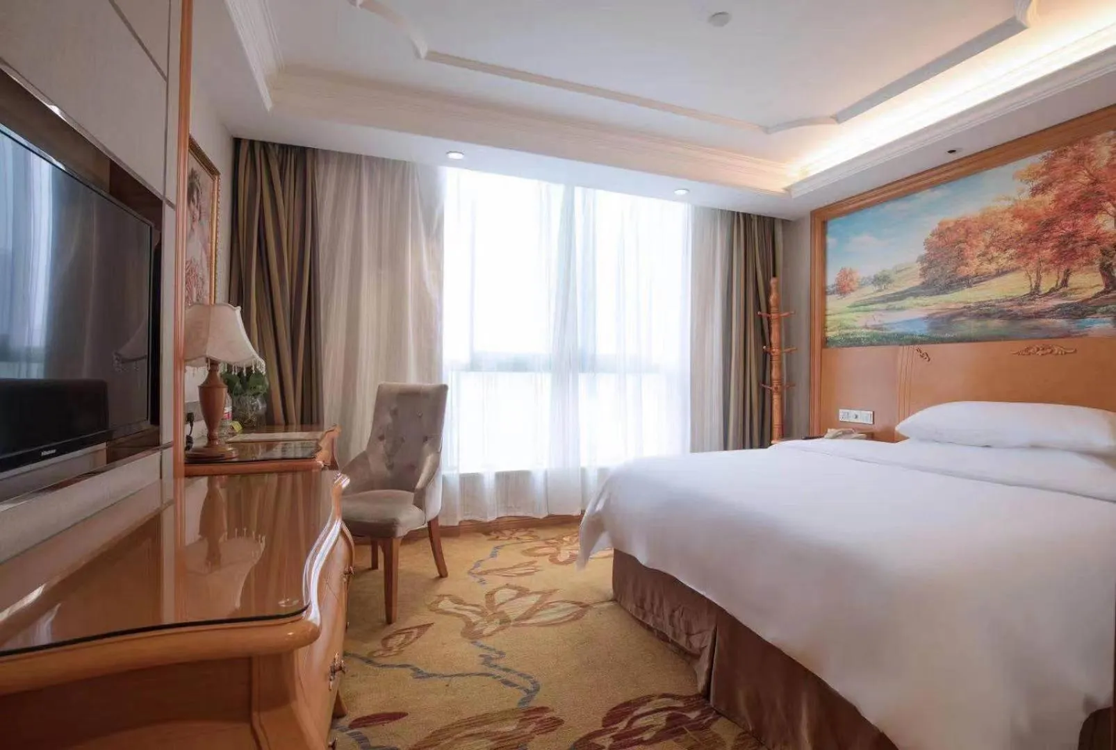 Bed in Vienna International Hotel Changsha Shumuling Subway Station