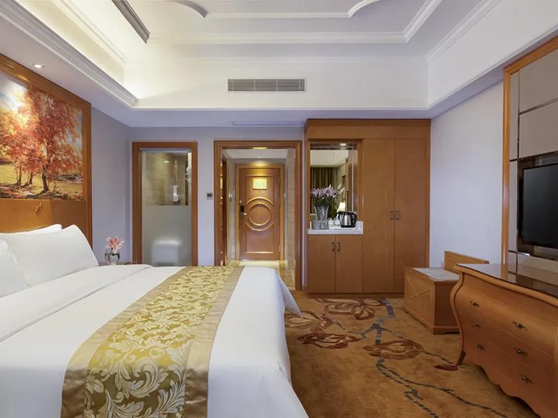 Bed in Vienna International Hotel Changsha Shumuling Subway Station