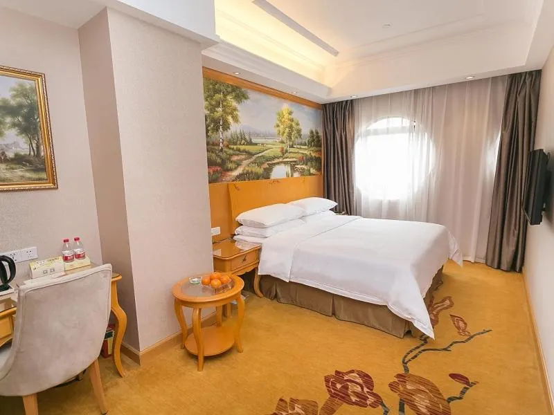 Bed in Vienna Hotel Guangzhou Beijing Road