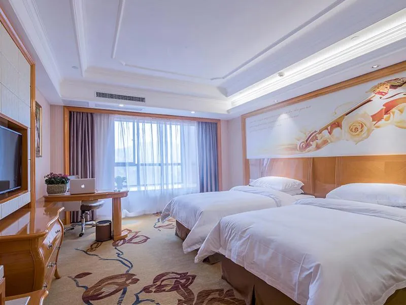 Bed in Vienna International Hotel Nanjing Hehai University Station