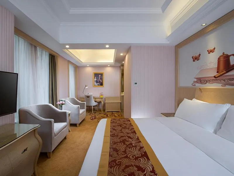 Bed in Vienna International Hotel Dongguan Shilonghuixing Business Central