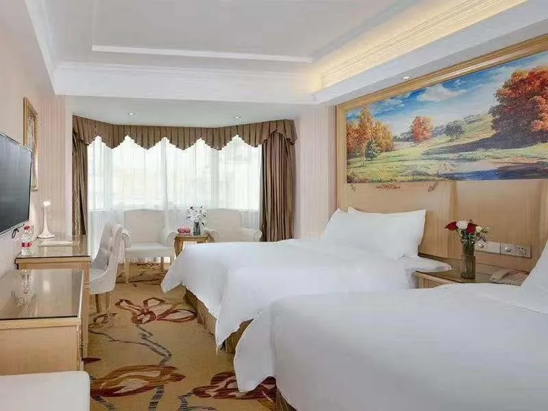 Bed in Vienna Hotel Huizhou Railway Station