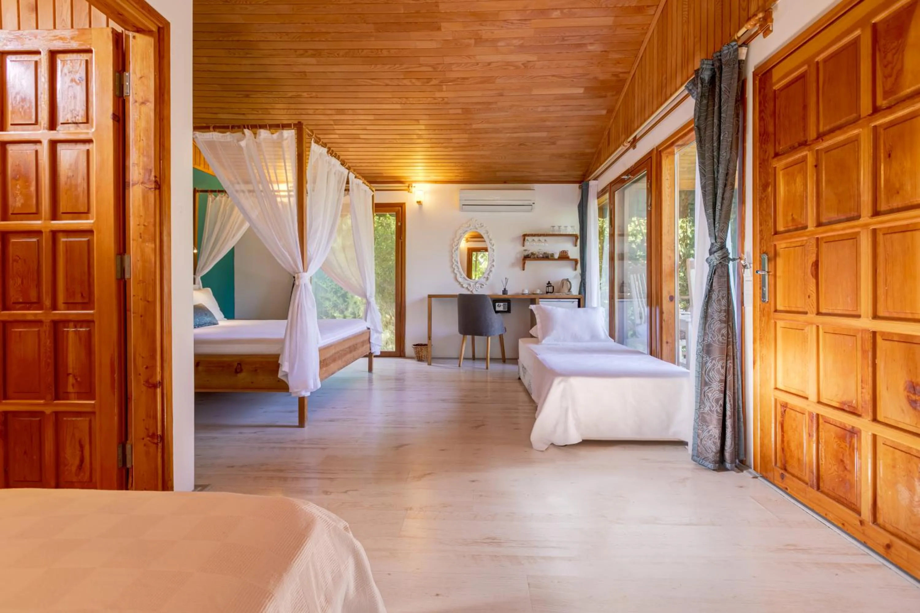 Bed in Etenna Beach Bungalows