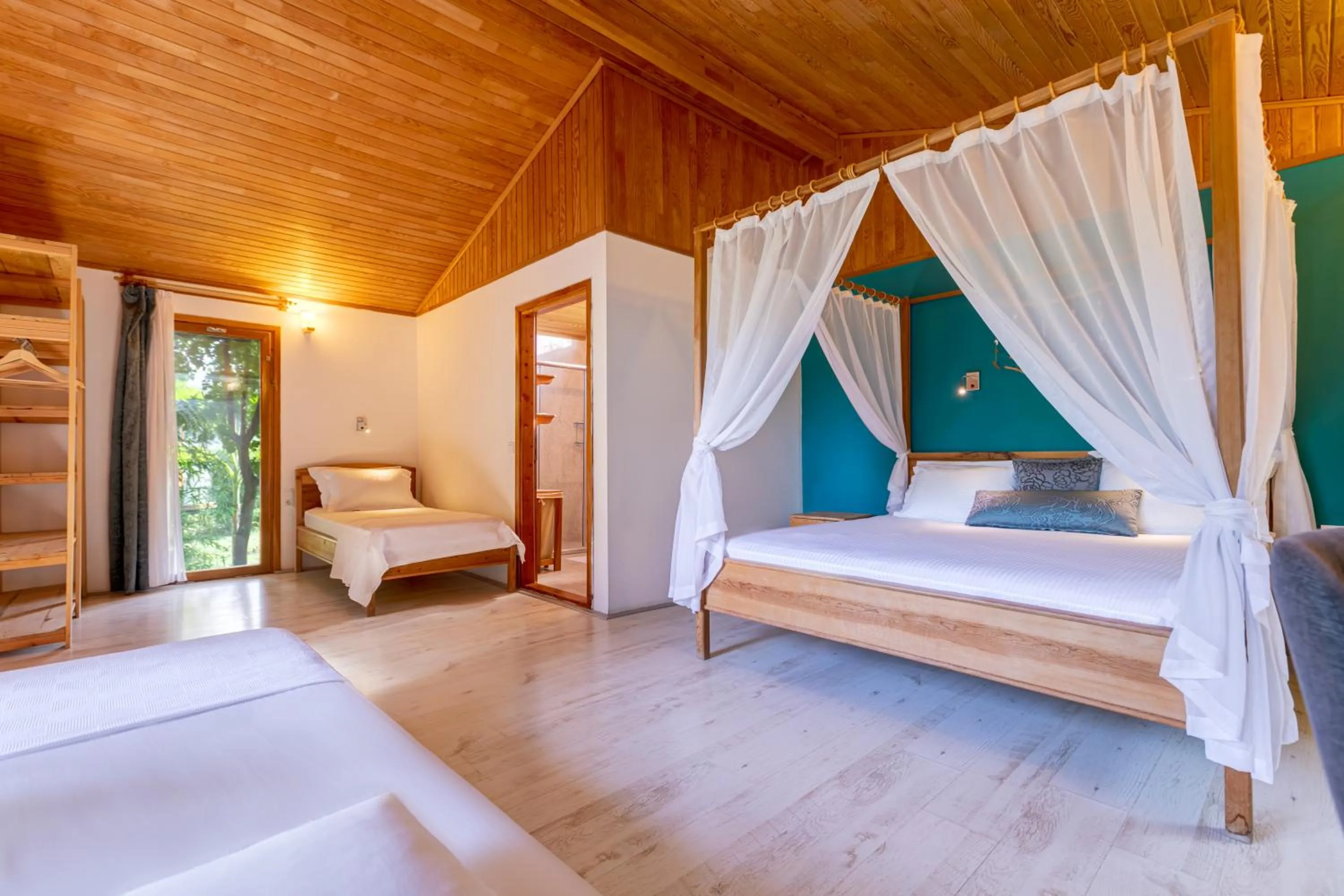 Bed in Etenna Beach Bungalows