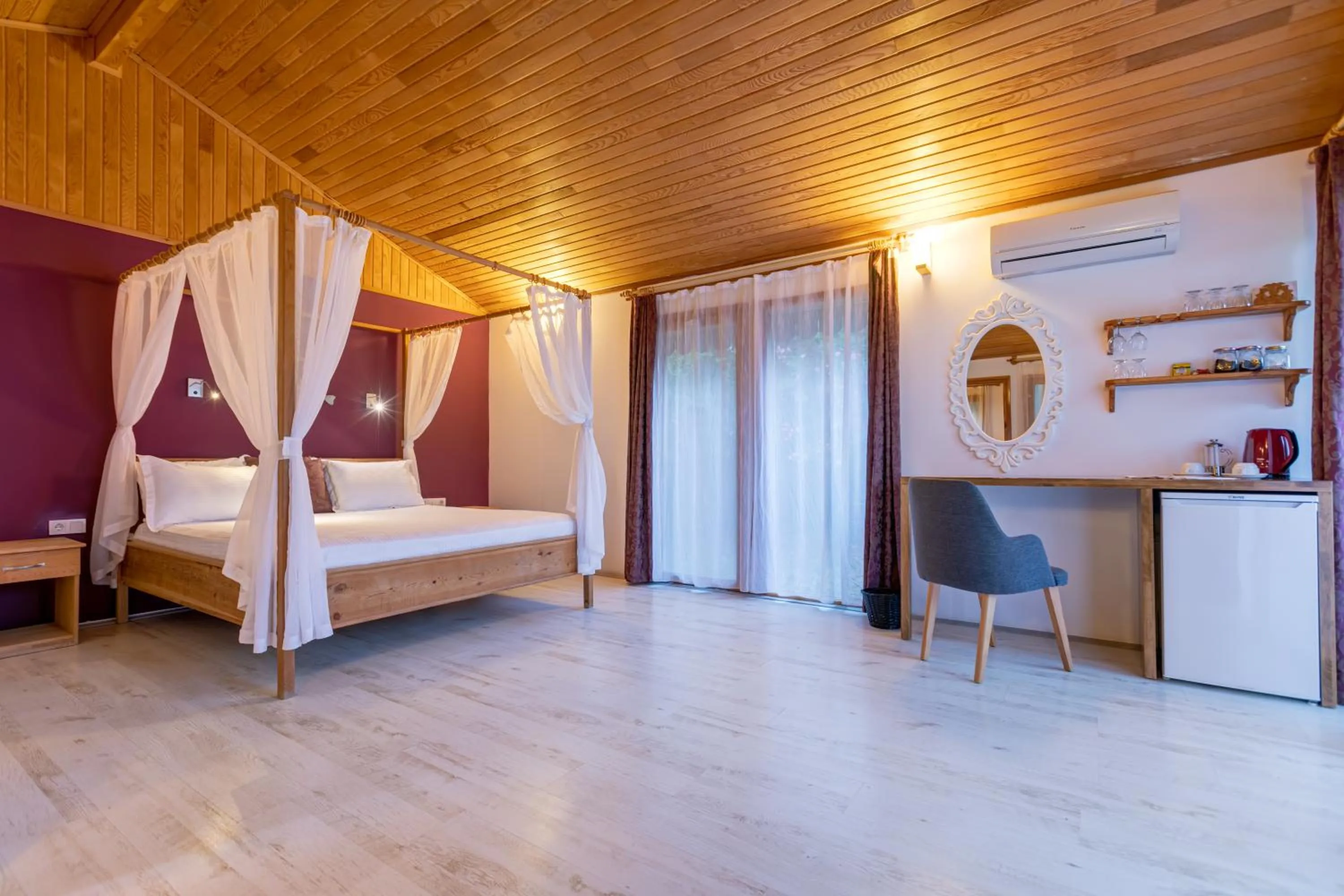 Bed in Etenna Beach Bungalows