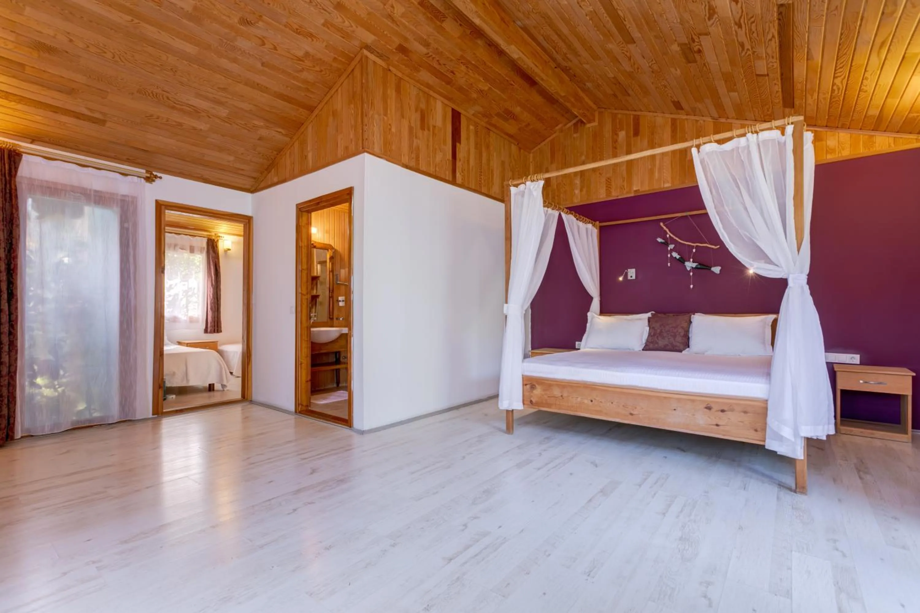 Bed in Etenna Beach Bungalows