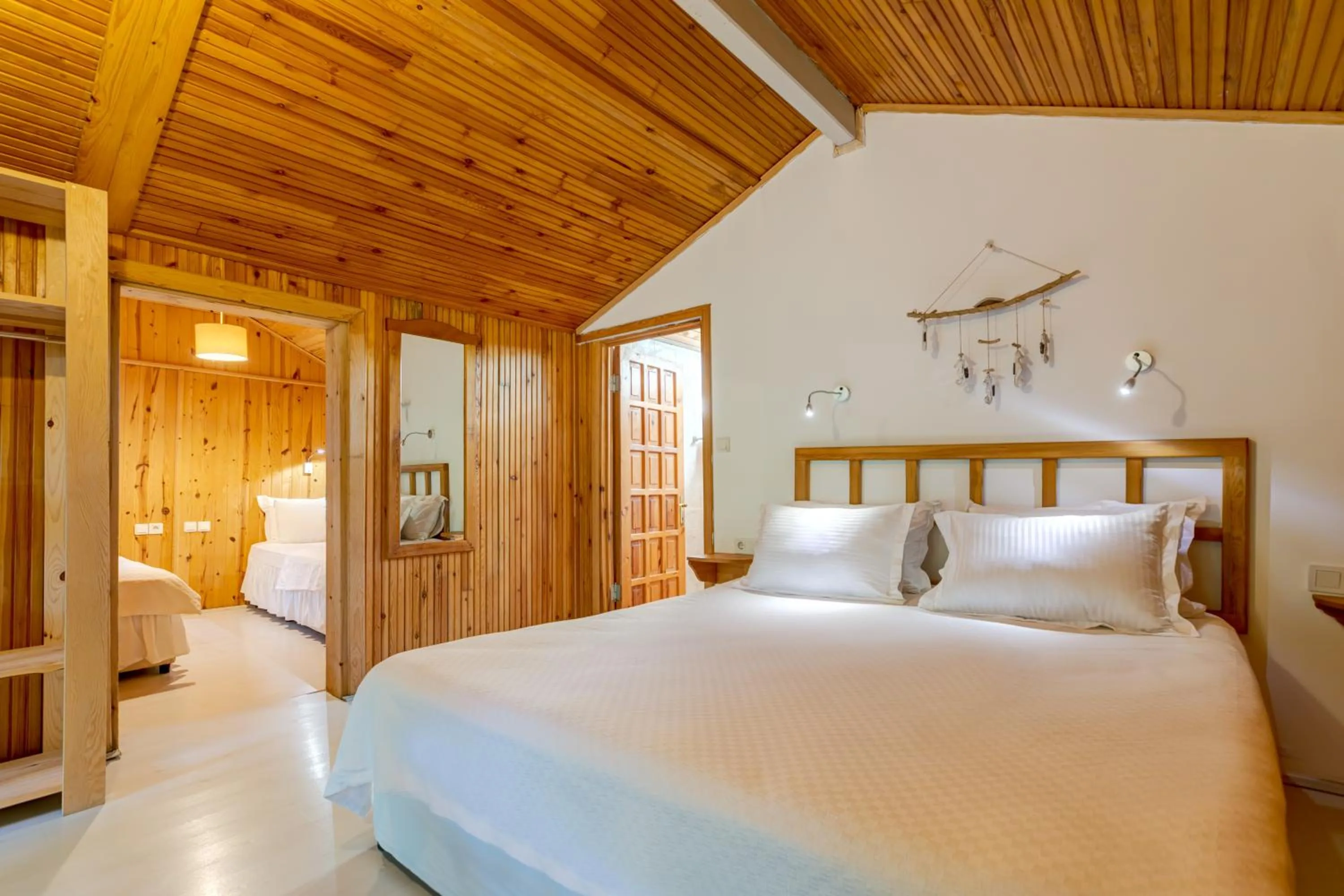 Bed in Etenna Beach Bungalows