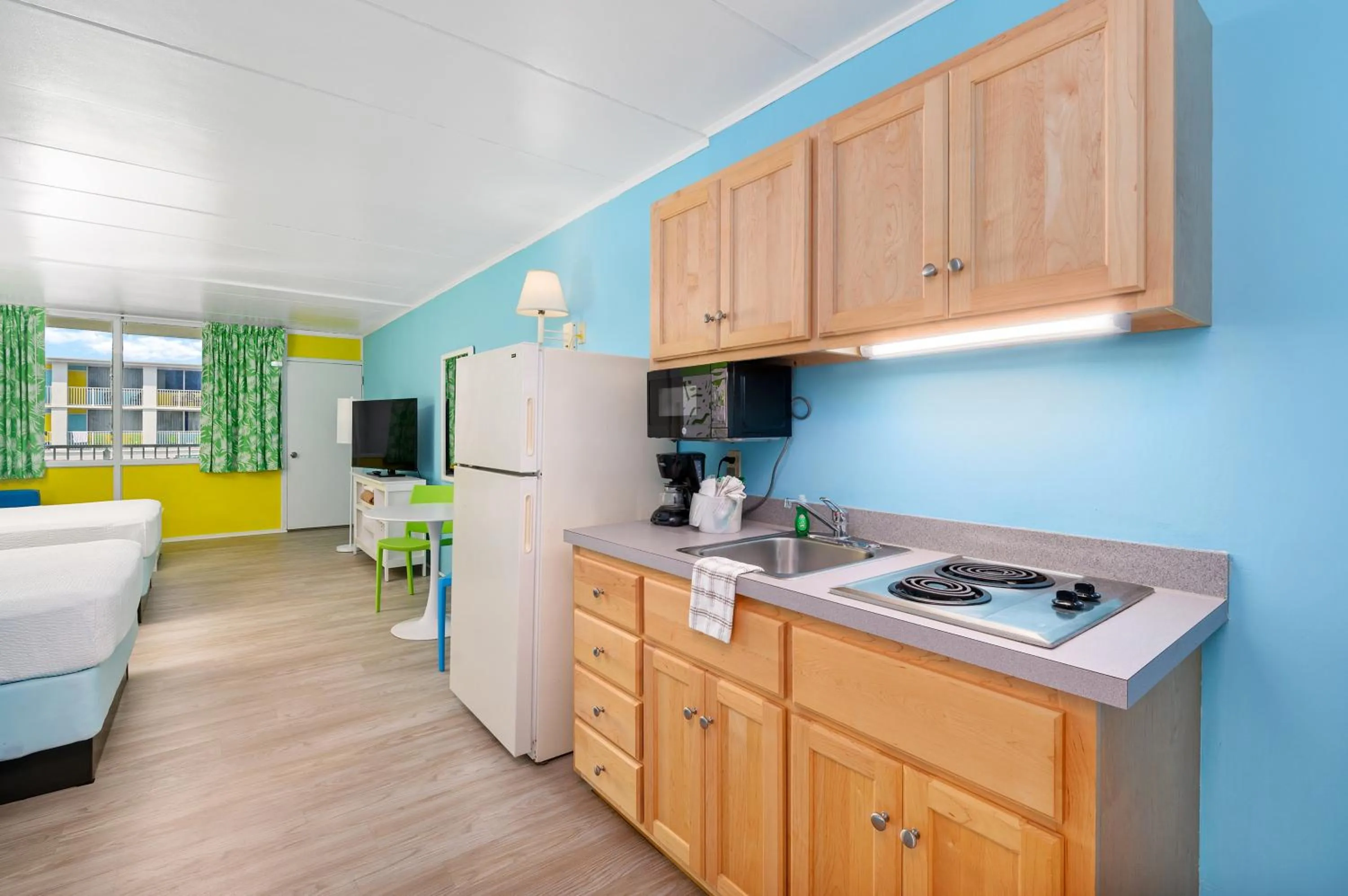 kitchen in Kokomo Suites