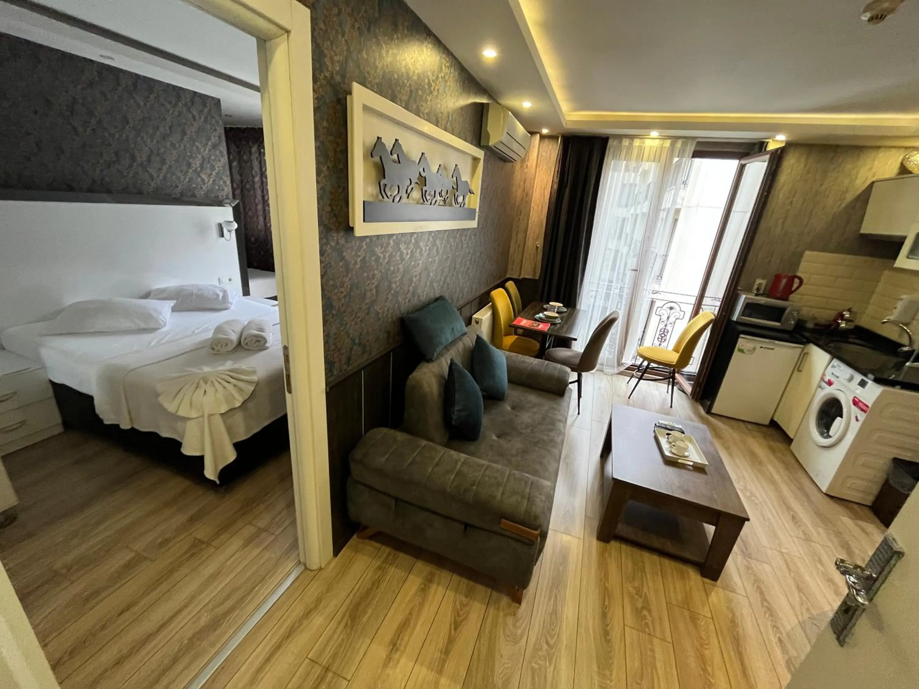 Bed in Dolce Vita Suite Hotel