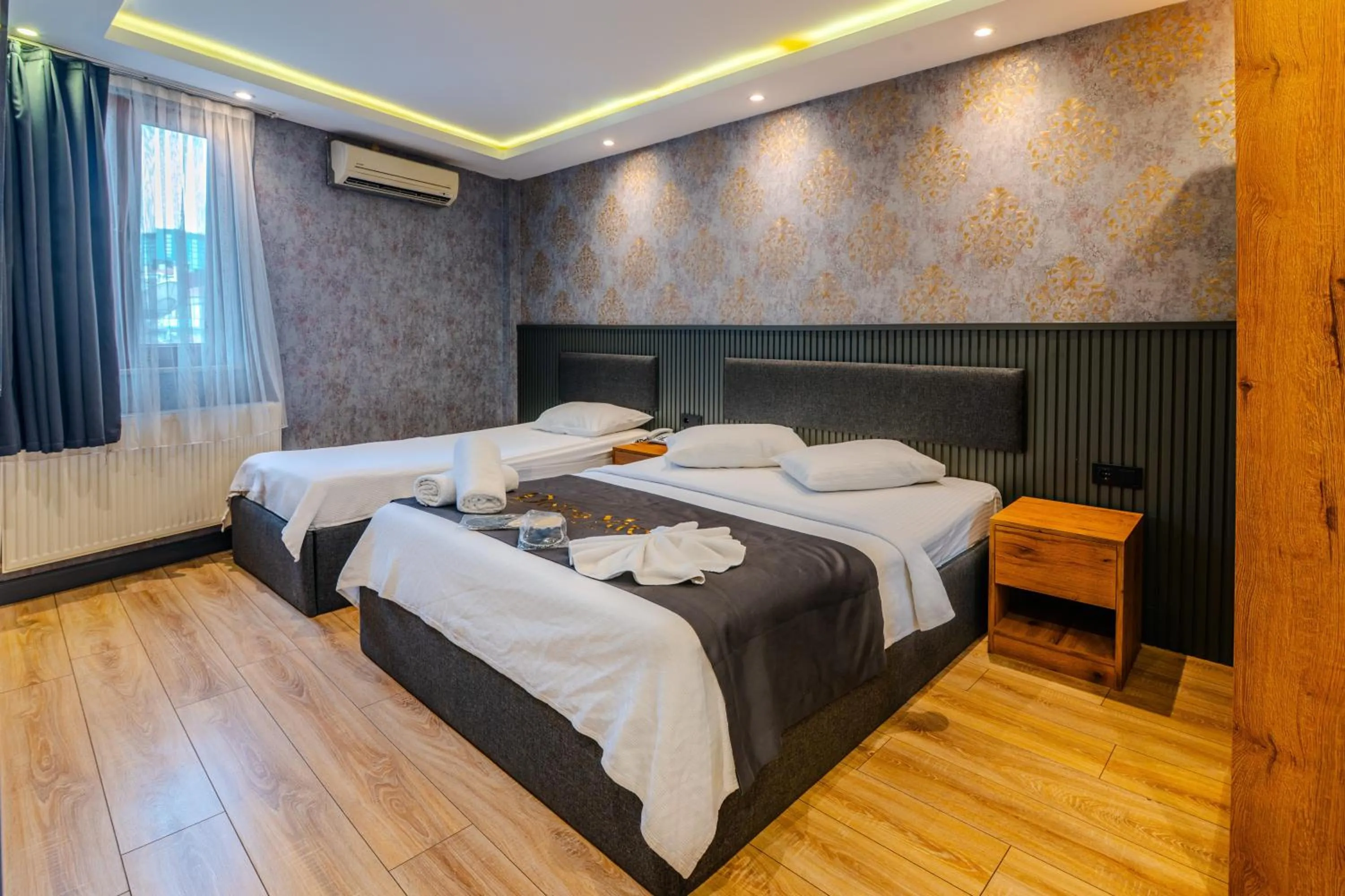 Bed in Dolce Vita Suite Hotel