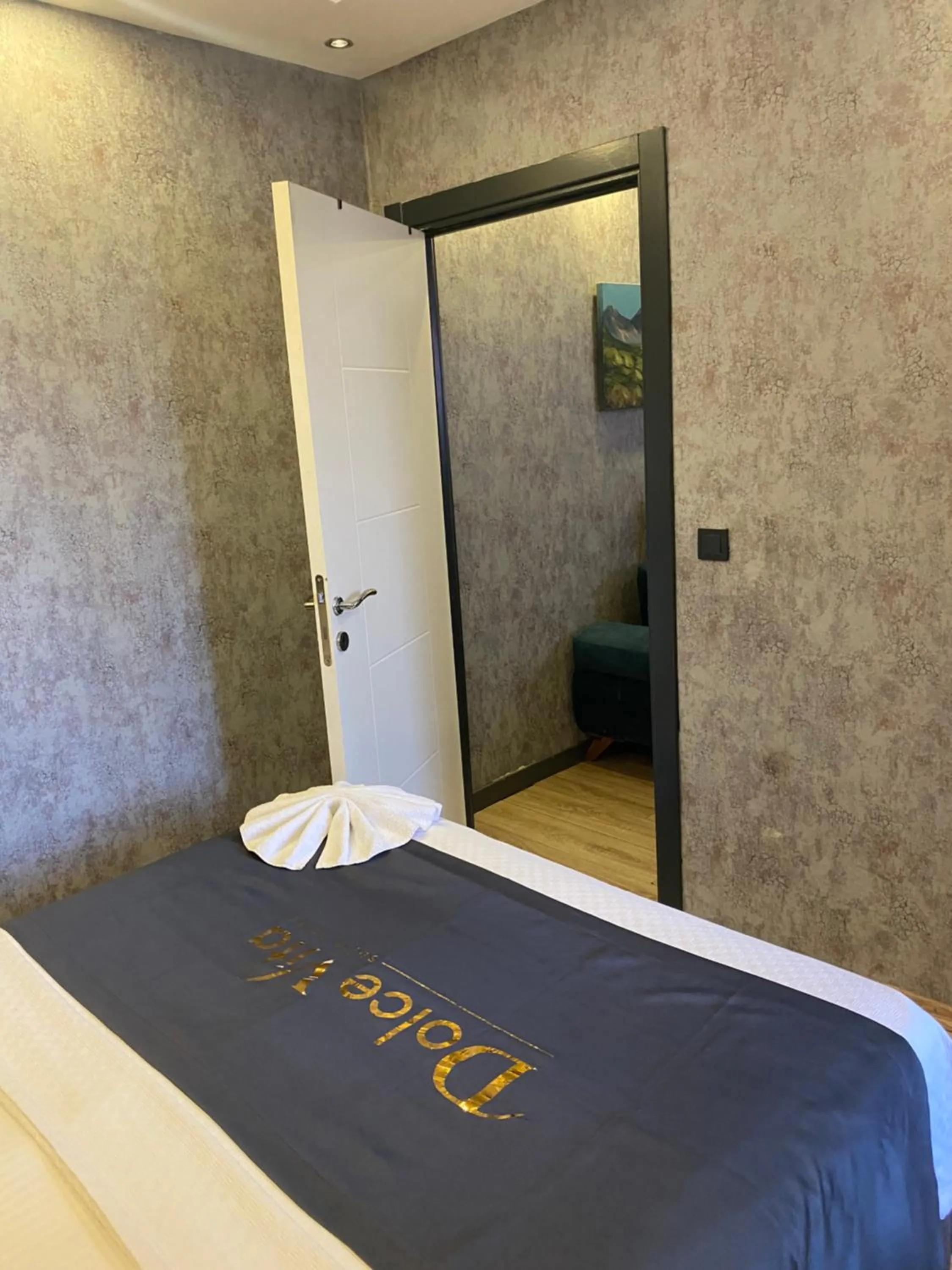 Photo of the whole room, Bed in Dolce Vita Suite Hotel