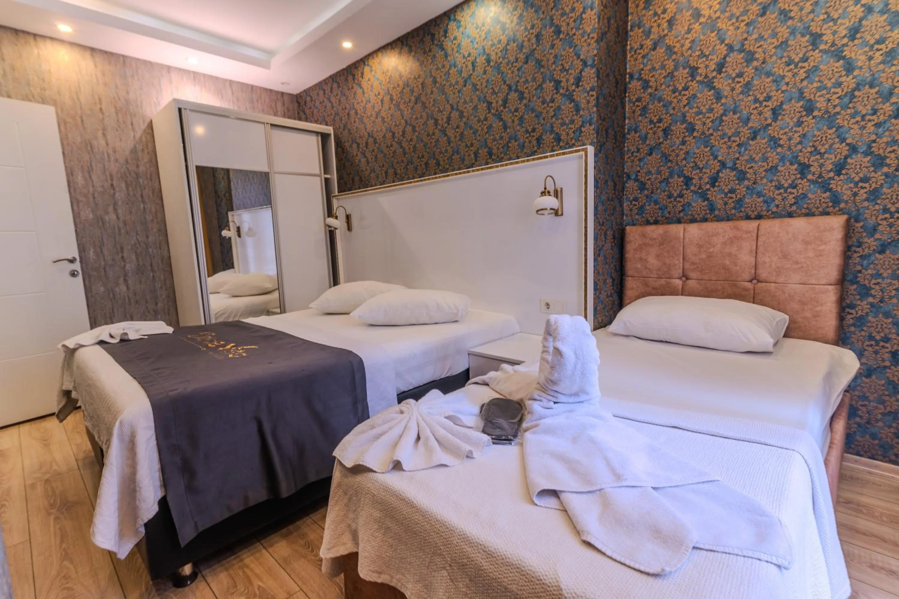 Bed in Dolce Vita Suite Hotel