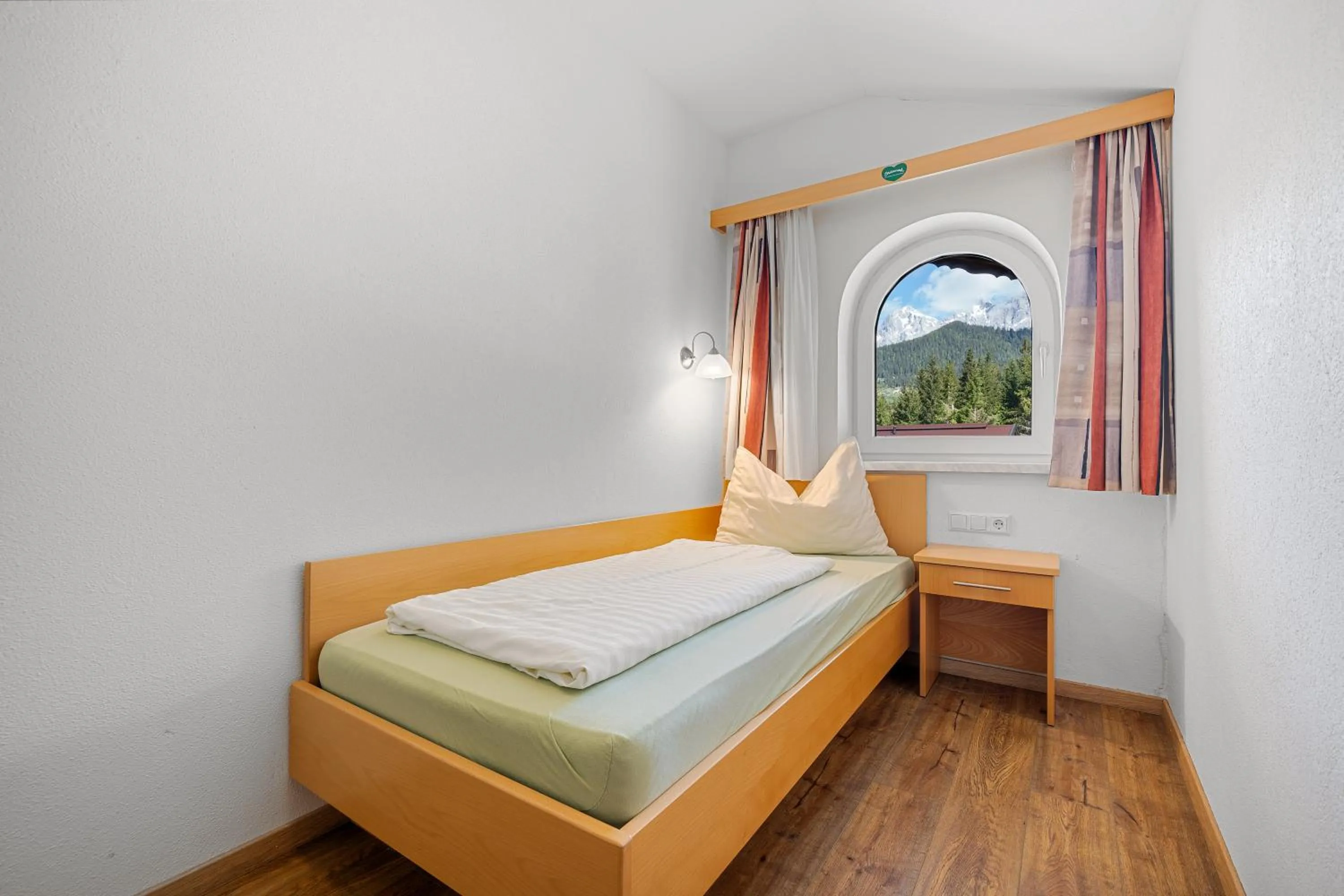 Bed in Aparthotel Sunrise