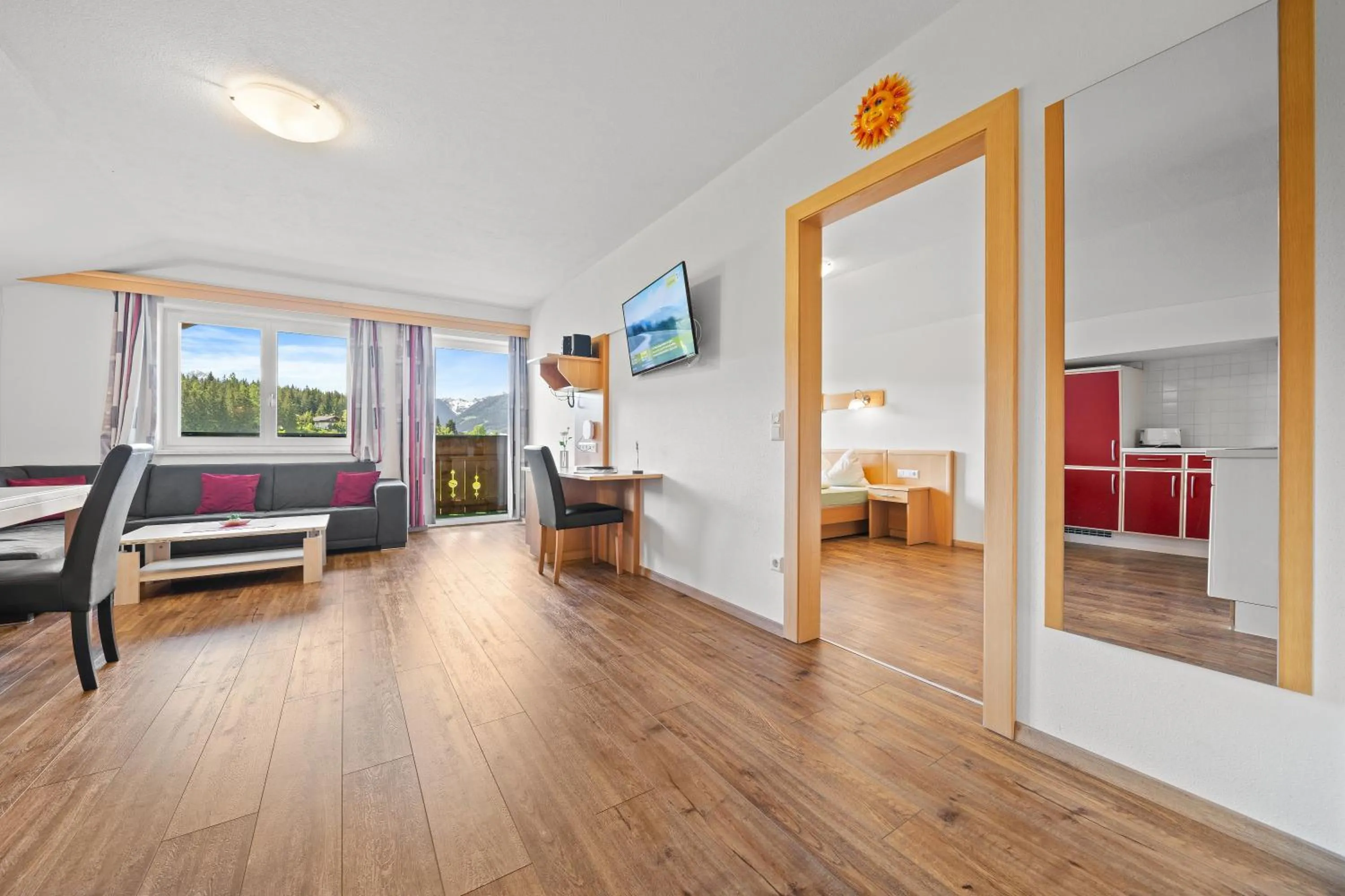 Living room, Bed in Aparthotel Sunrise