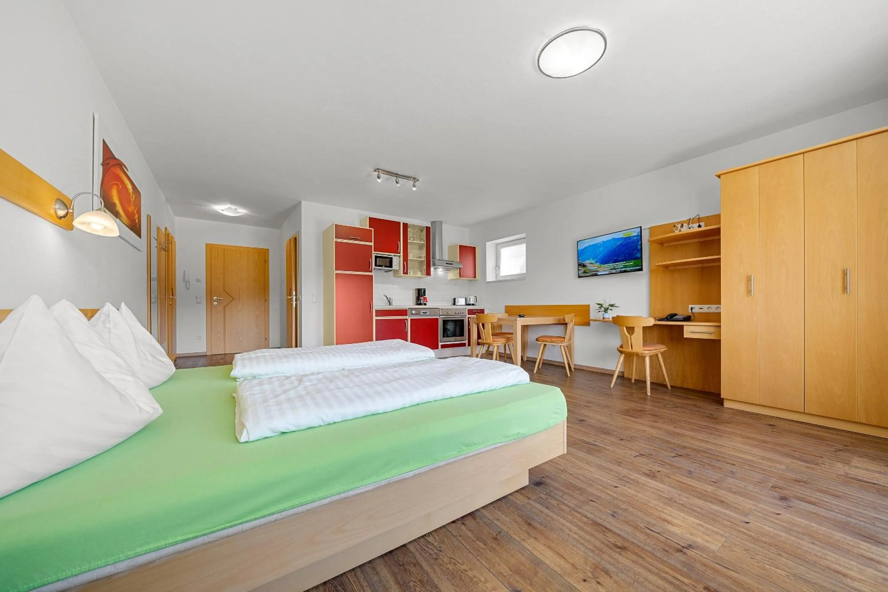 Dining area, Bed in Aparthotel Sunrise