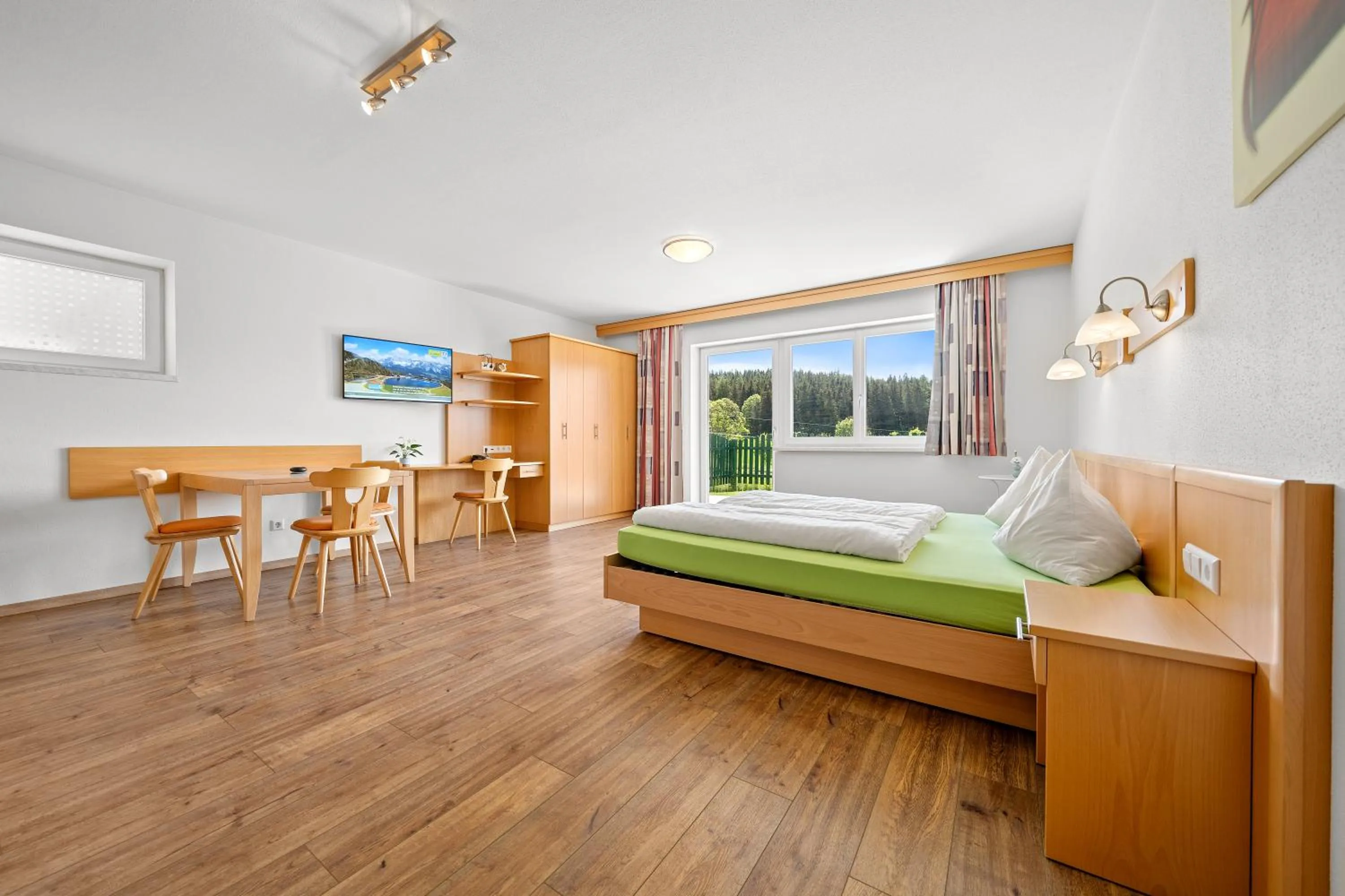 Dining area, Bed in Aparthotel Sunrise