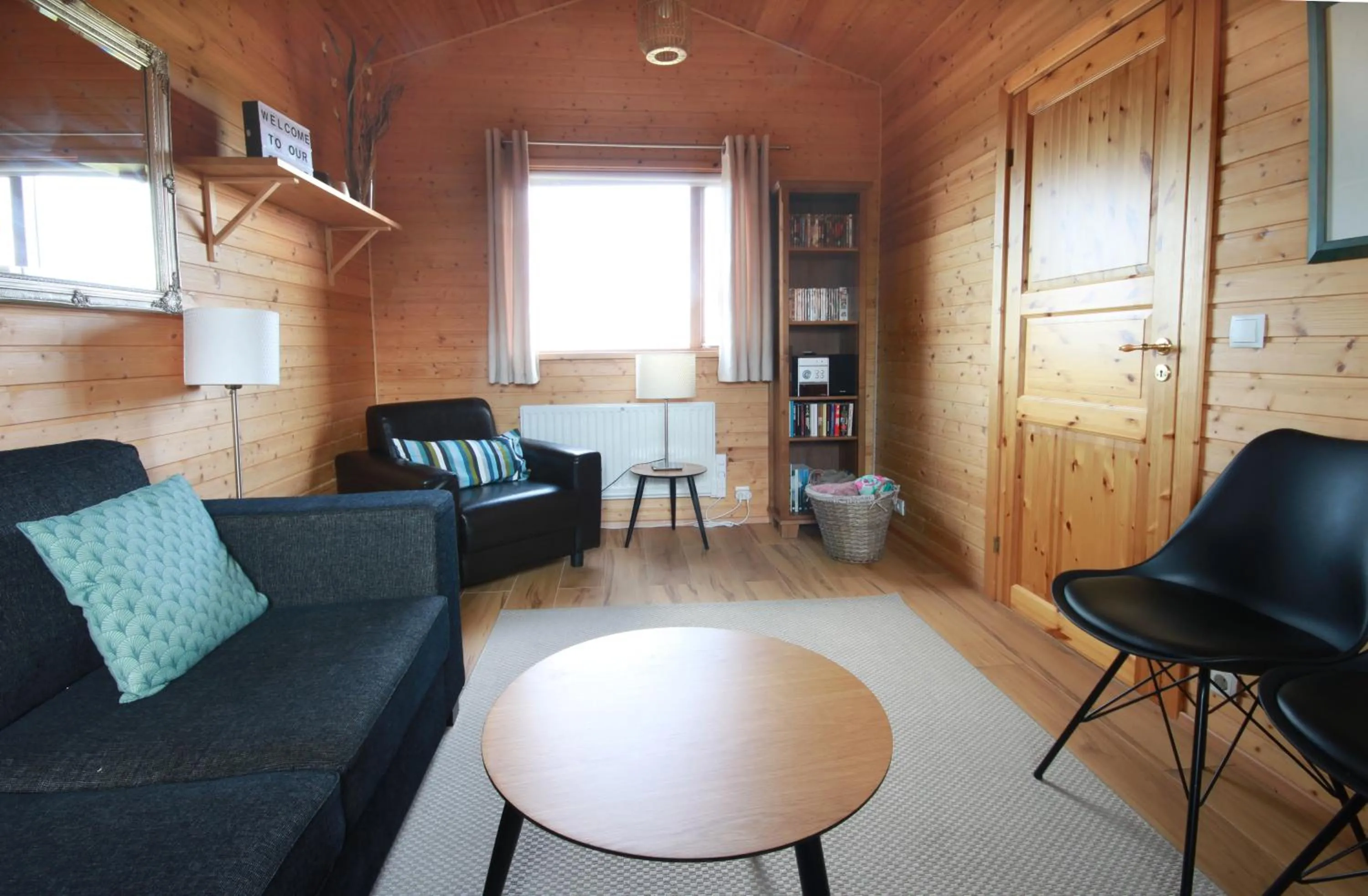 Seating area in Cozy Cottage by Stay in Iceland