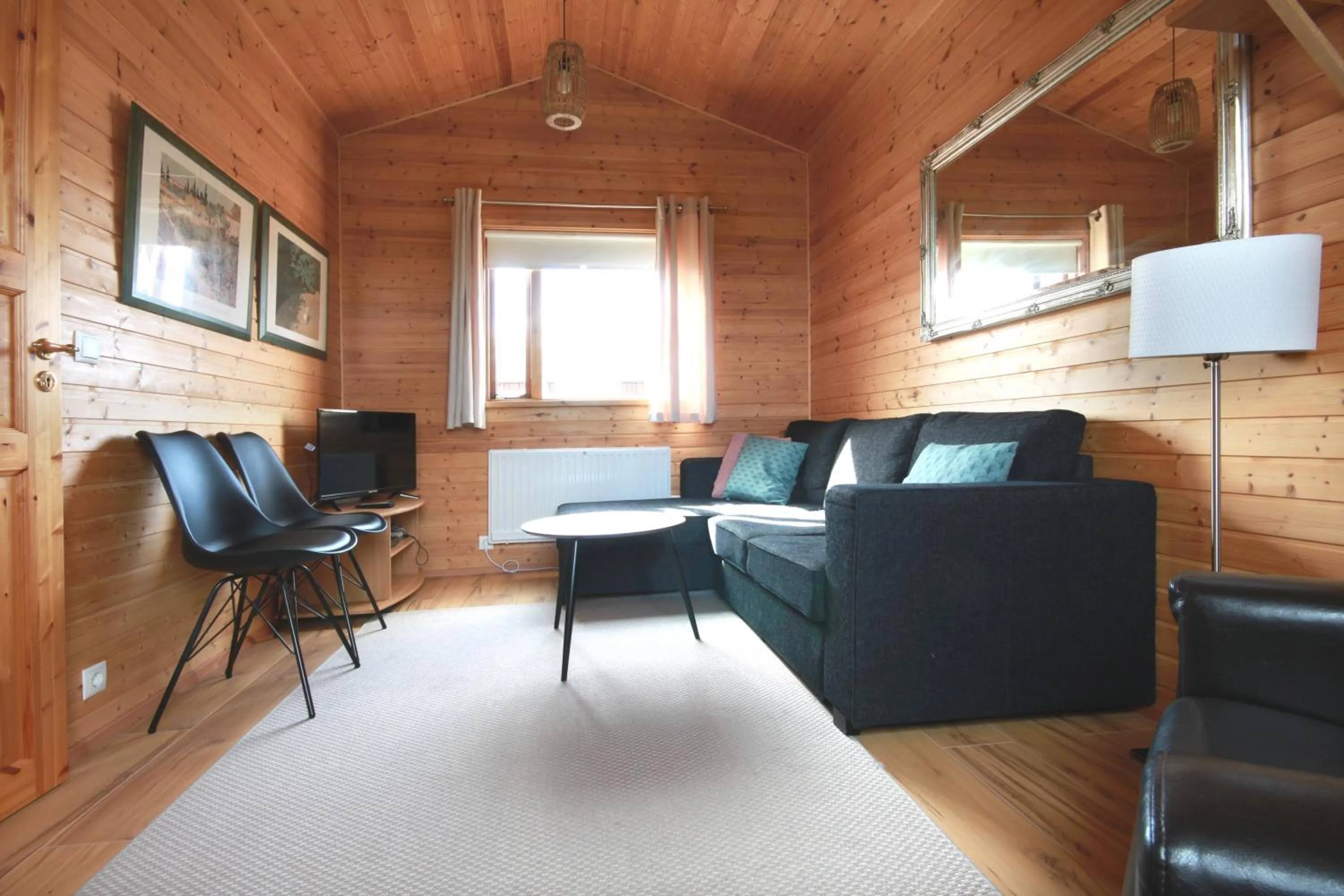 Living room in Cozy Cottage by Stay in Iceland