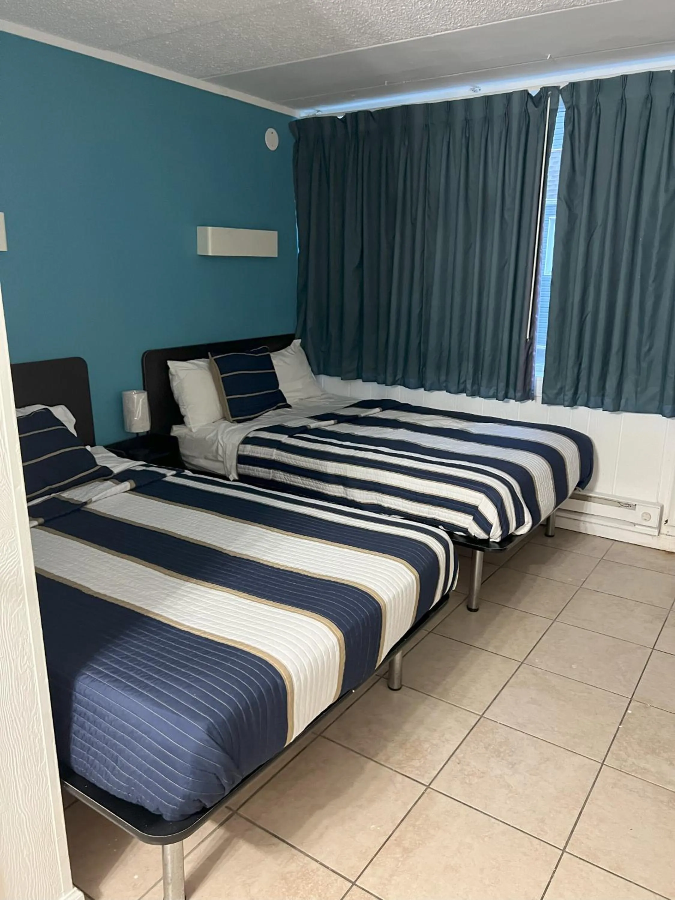 Bed in AIRE Hotel North Beach Jersey Shore