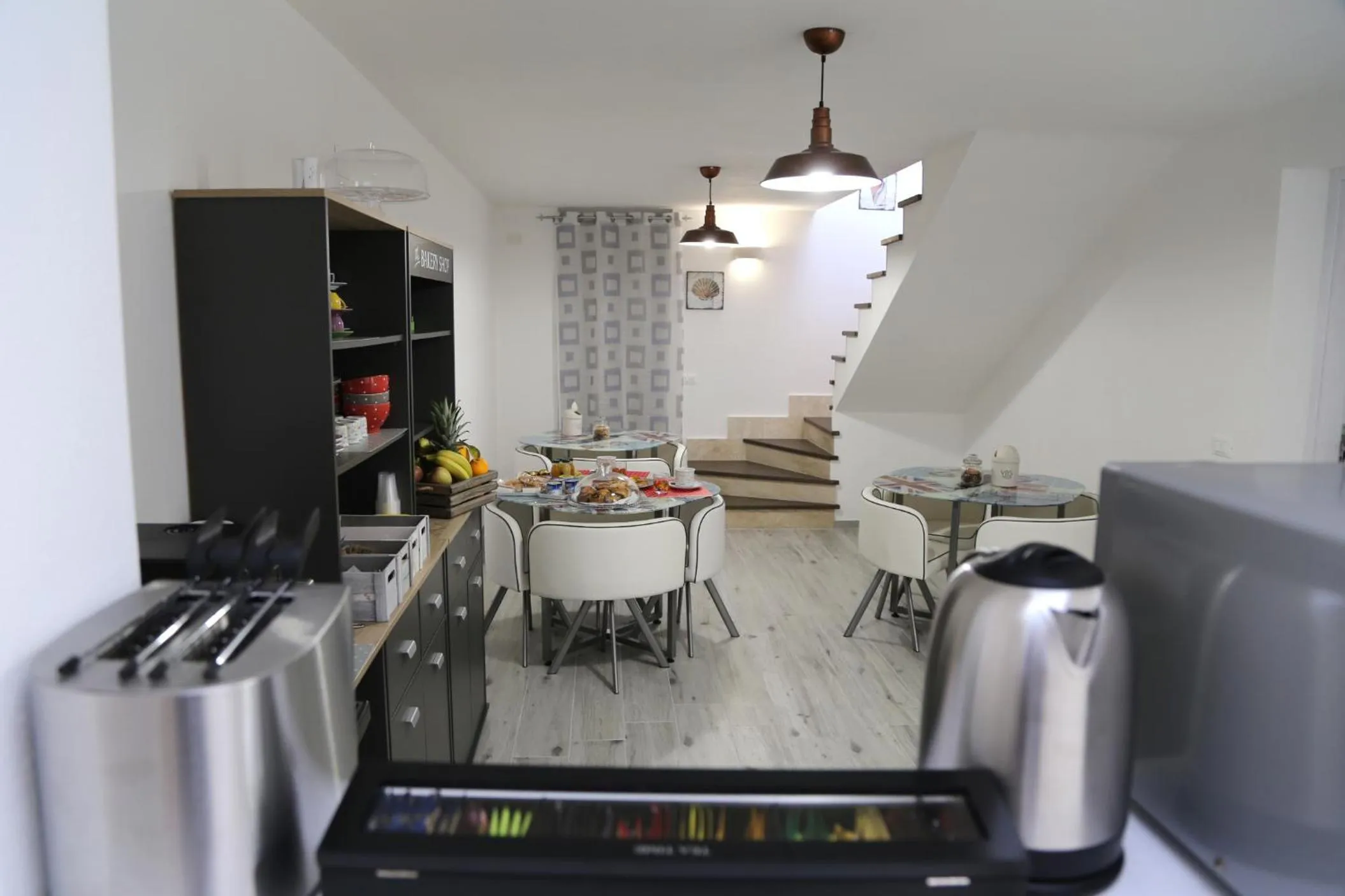 Communal lounge/ TV room in B&B COSTA