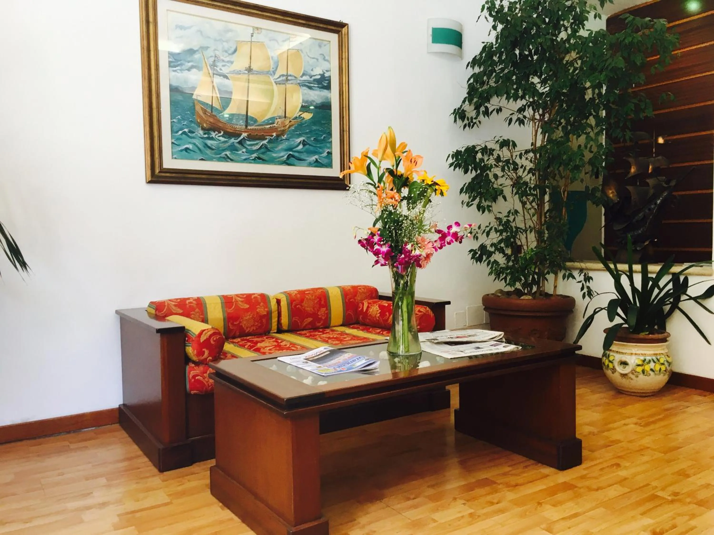 Communal lounge/ TV room in Hotel La Bussola