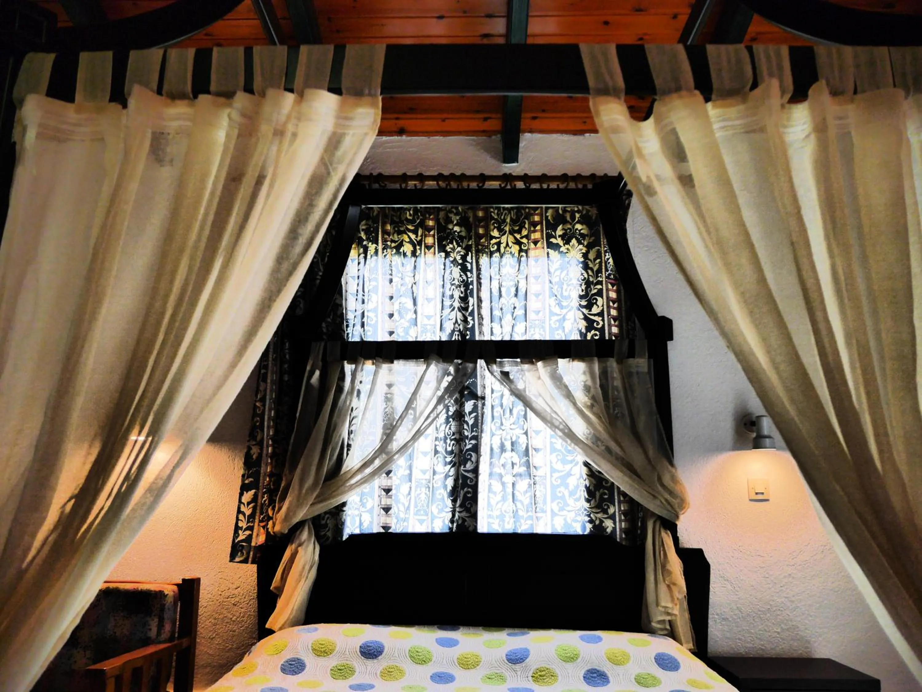 Bed in Blue Bay Beach Hotel