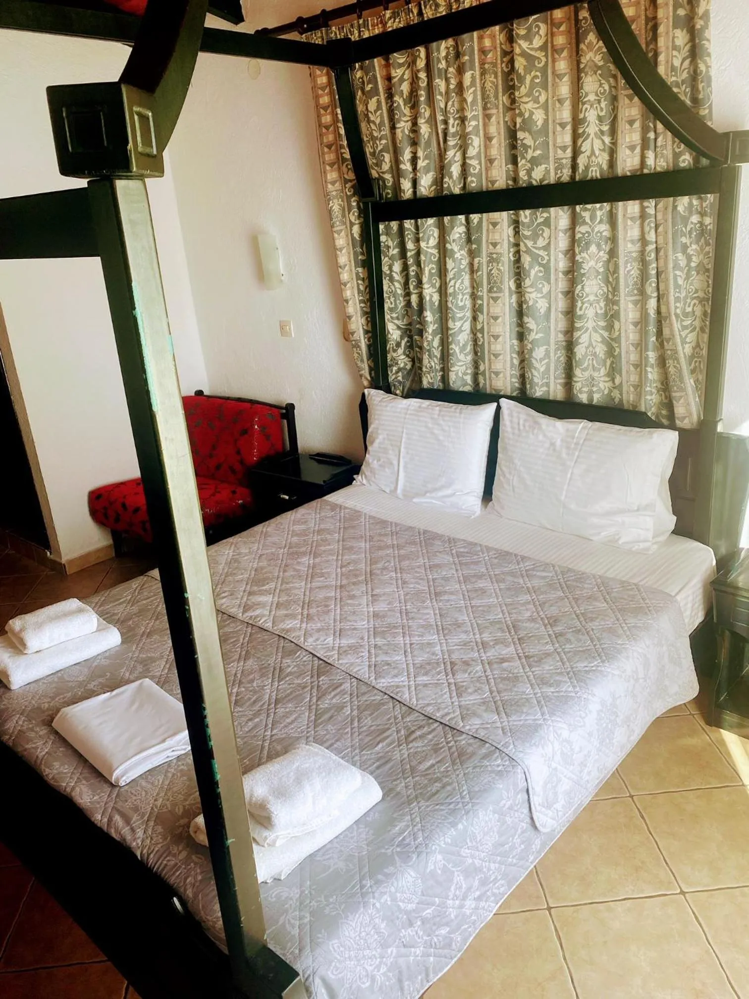 Bed in Blue Bay Beach Hotel