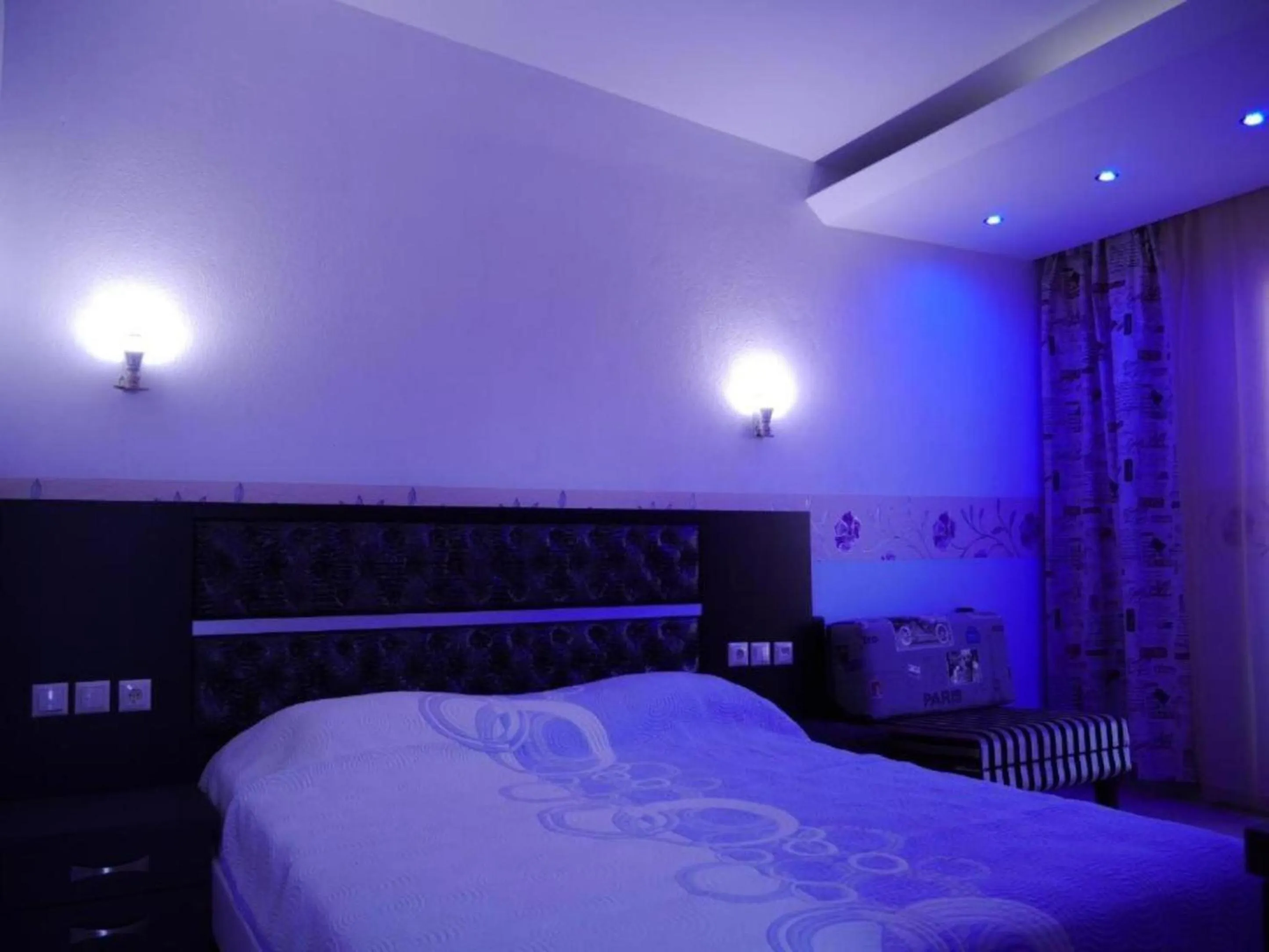 Bed in Blue Bay Beach Hotel