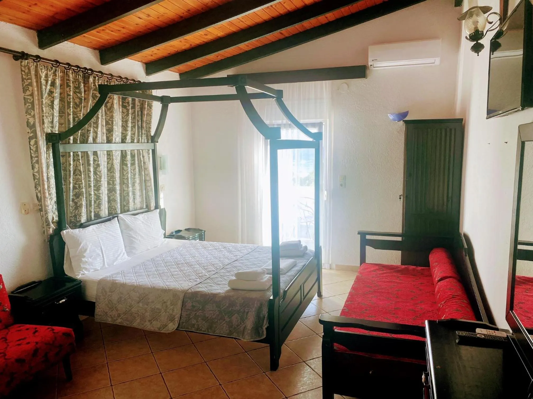 Bed in Blue Bay Beach Hotel